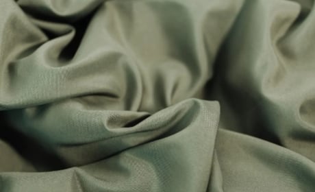 Яку тканину використовують для пошиття куртки?